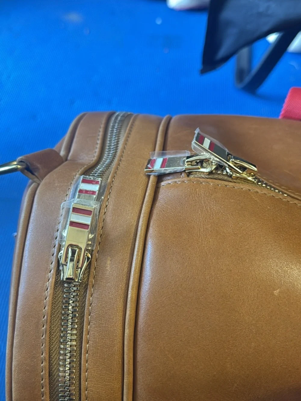NWT— Wilson Tan Leather Duffel Bag with Red-Striped Straps